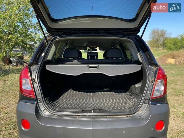 Чорний Опель Антара, об'ємом двигуна 2.2 л та пробігом 159 тис. км за 10000 $, фото 6 на Automoto.ua