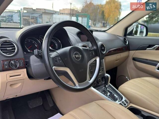 Черный Опель Антара, объемом двигателя 2.23 л и пробегом 149 тыс. км за 11500 $, фото 10 на Automoto.ua