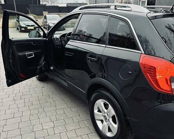 Черный Опель Антара, объемом двигателя 2.2 л и пробегом 180 тыс. км за 12800 $, фото 6 на Automoto.ua