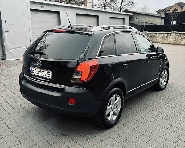 Черный Опель Антара, объемом двигателя 2.2 л и пробегом 180 тыс. км за 12800 $, фото 5 на Automoto.ua