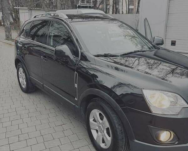 Черный Опель Антара, объемом двигателя 2.2 л и пробегом 180 тыс. км за 12800 $, фото 3 на Automoto.ua