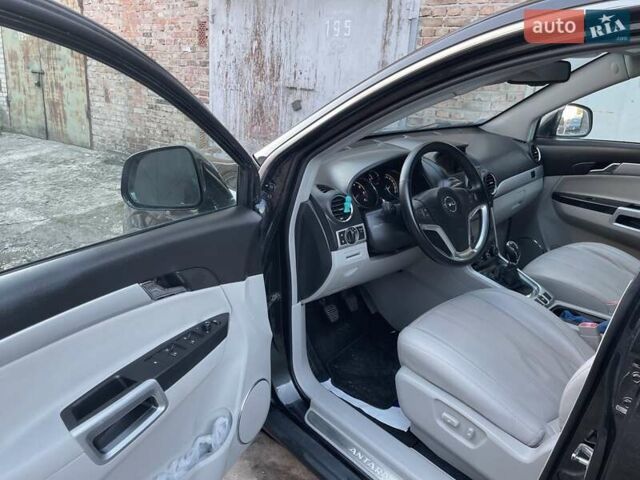 Чорний Опель Антара, об'ємом двигуна 2.2 л та пробігом 138 тис. км за 12450 $, фото 63 на Automoto.ua