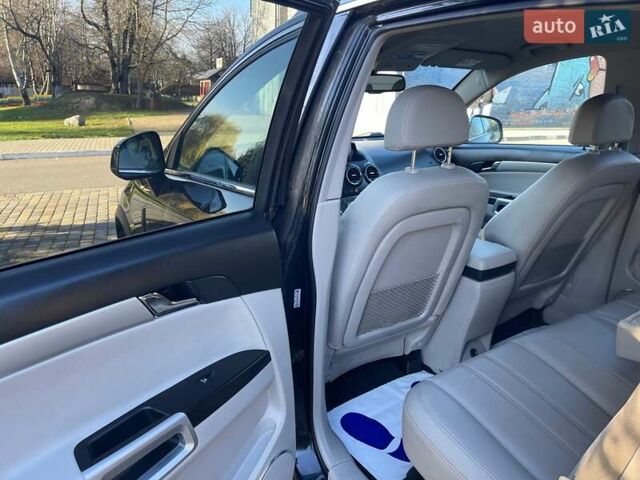 Черный Опель Антара, объемом двигателя 2.2 л и пробегом 138 тыс. км за 12985 $, фото 56 на Automoto.ua