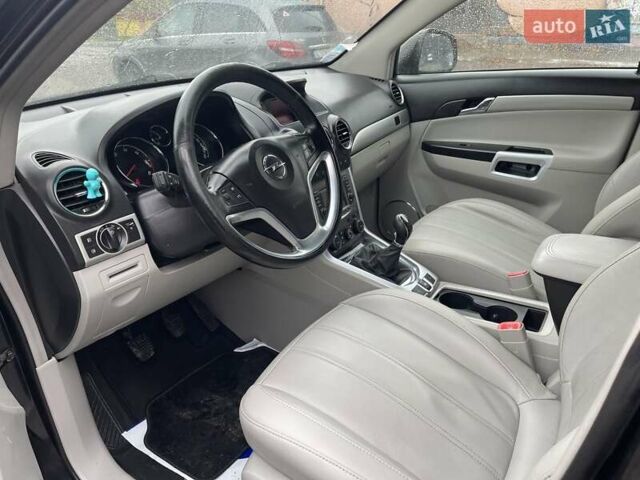 Черный Опель Антара, объемом двигателя 2.2 л и пробегом 138 тыс. км за 12850 $, фото 4 на Automoto.ua