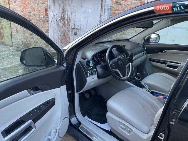 Черный Опель Антара, объемом двигателя 2.2 л и пробегом 138 тыс. км за 12985 $, фото 69 на Automoto.ua