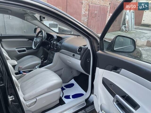 Чорний Опель Антара, об'ємом двигуна 2.2 л та пробігом 138 тис. км за 12450 $, фото 61 на Automoto.ua