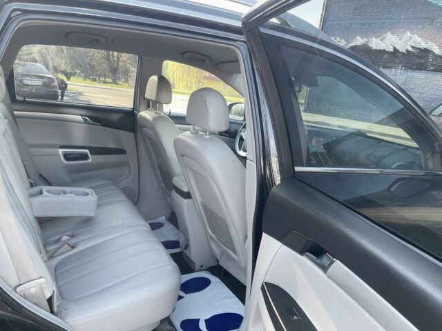 Чорний Опель Антара, об'ємом двигуна 2.2 л та пробігом 138 тис. км за 12450 $, фото 3 на Automoto.ua