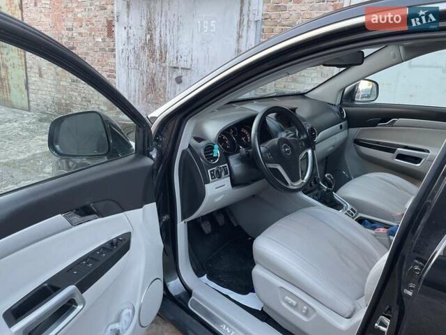 Чорний Опель Антара, об'ємом двигуна 2.2 л та пробігом 138 тис. км за 12450 $, фото 62 на Automoto.ua