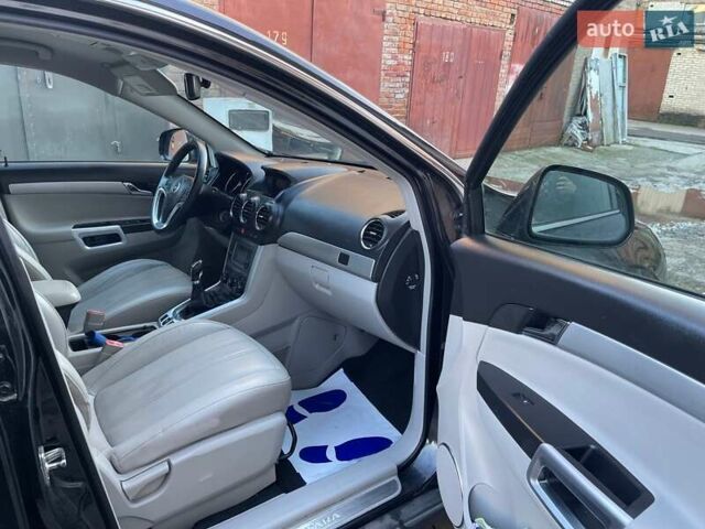 Черный Опель Антара, объемом двигателя 2.2 л и пробегом 138 тыс. км за 12985 $, фото 68 на Automoto.ua