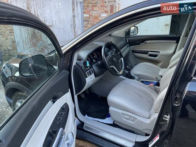 Черный Опель Антара, объемом двигателя 2.2 л и пробегом 138 тыс. км за 12985 $, фото 66 на Automoto.ua