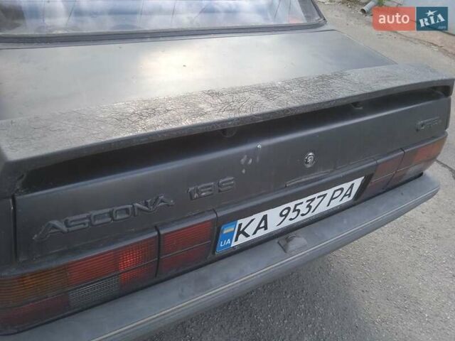 Черный Опель Аскона, объемом двигателя 1.8 л и пробегом 500 тыс. км за 650 $, фото 1 на Automoto.ua