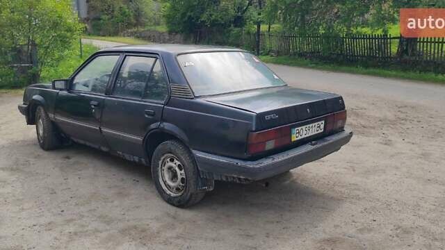 Черный Опель Аскона, объемом двигателя 1.6 л и пробегом 200 тыс. км за 500 $, фото 3 на Automoto.ua