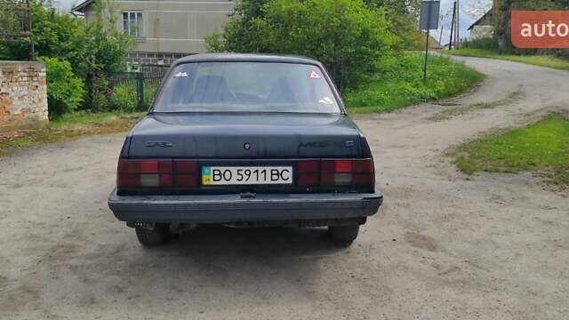 Черный Опель Аскона, объемом двигателя 1.6 л и пробегом 200 тыс. км за 500 $, фото 4 на Automoto.ua