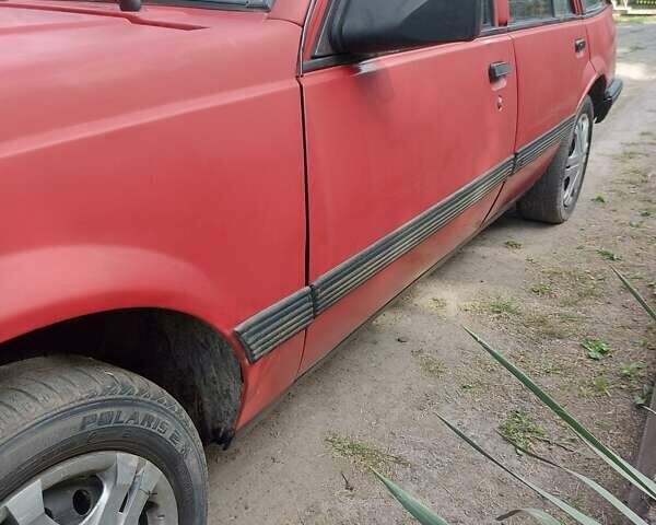 Червоний Опель Аскона, об'ємом двигуна 1.4 л та пробігом 200 тис. км за 450 $, фото 4 на Automoto.ua