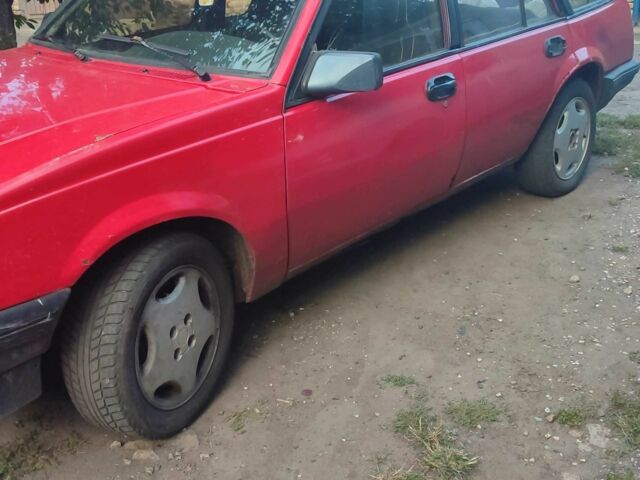 Красный Опель Аскона, объемом двигателя 2 л и пробегом 30 тыс. км за 691 $, фото 2 на Automoto.ua