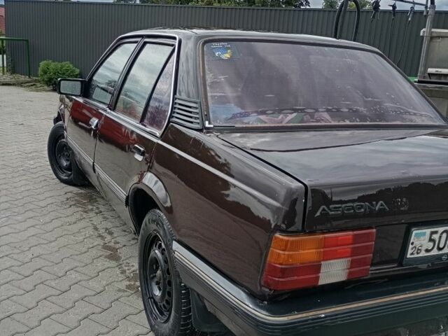 Красный Опель Аскона, объемом двигателя 1 л и пробегом 60 тыс. км за 550 $, фото 1 на Automoto.ua