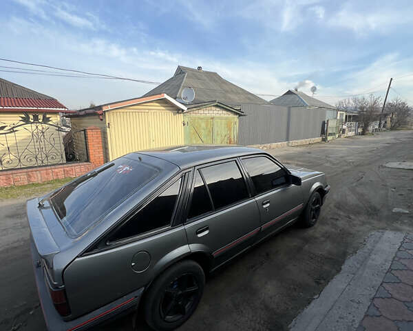 Сірий Опель Аскона, об'ємом двигуна 2 л та пробігом 400 тис. км за 899 $, фото 6 на Automoto.ua