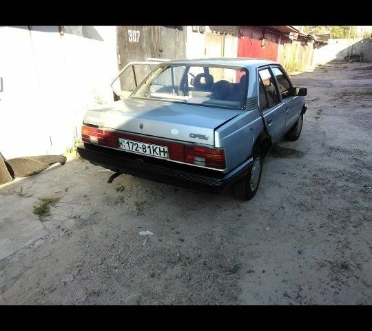 Серый Опель Аскона, объемом двигателя 1.4 л и пробегом 300 тыс. км за 473 $, фото 3 на Automoto.ua