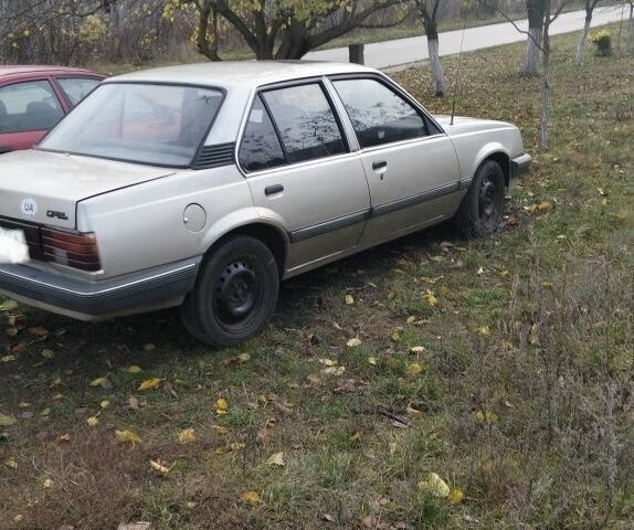 Серый Опель Аскона, объемом двигателя 1.6 л и пробегом 333 тыс. км за 592 $, фото 1 на Automoto.ua