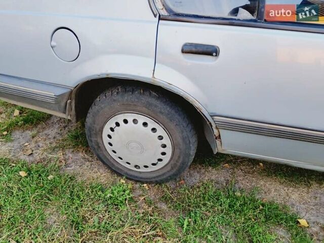 Сірий Опель Аскона, об'ємом двигуна 1.6 л та пробігом 652 тис. км за 900 $, фото 14 на Automoto.ua