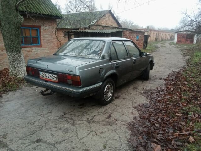 Серый Опель Аскона, объемом двигателя 1.6 л и пробегом 220 тыс. км за 850 $, фото 3 на Automoto.ua