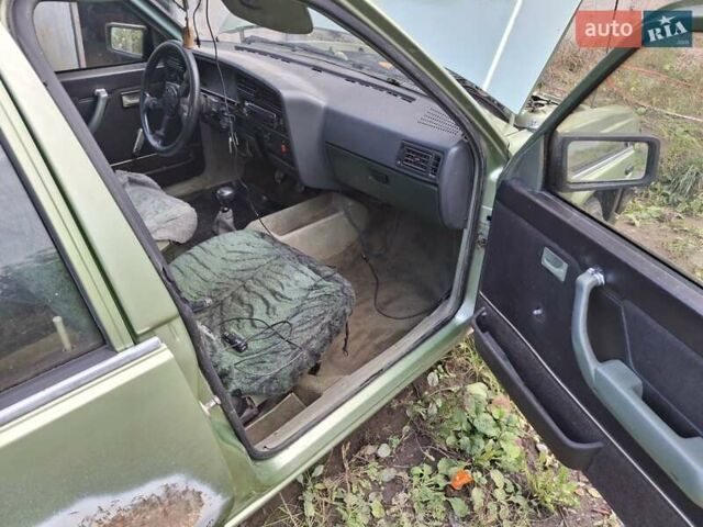 Зеленый Опель Аскона, объемом двигателя 1.6 л и пробегом 152 тыс. км за 800 $, фото 2 на Automoto.ua