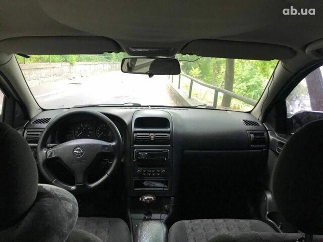 Серый Опель Астра Г, объемом двигателя 1.6 л и пробегом 304 тыс. км за 2999 $, фото 17 на Automoto.ua