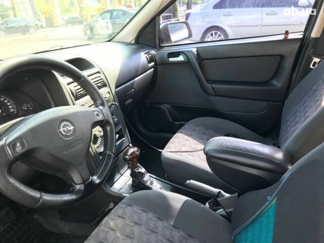 Серый Опель Астра Г, объемом двигателя 1.6 л и пробегом 304 тыс. км за 2999 $, фото 19 на Automoto.ua