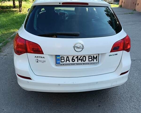 Білий Опель Астра ГТЦ, об'ємом двигуна 1.3 л та пробігом 320 тис. км за 6000 $, фото 9 на Automoto.ua