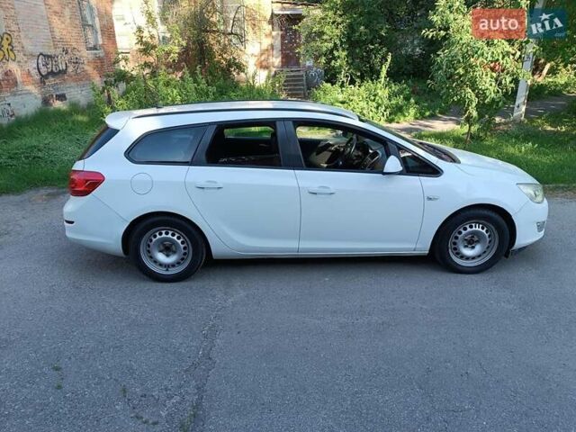 Білий Опель Астра ГТЦ, об'ємом двигуна 1.3 л та пробігом 320 тис. км за 6000 $, фото 8 на Automoto.ua