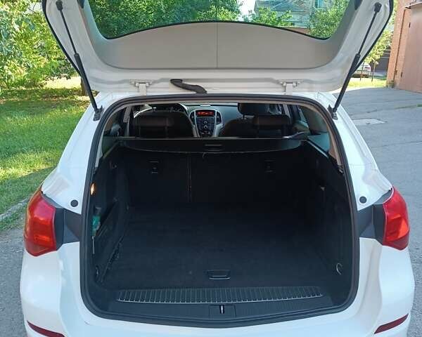 Білий Опель Астра ГТЦ, об'ємом двигуна 1.3 л та пробігом 320 тис. км за 6000 $, фото 5 на Automoto.ua