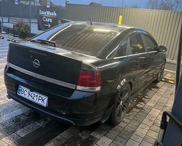 Черный Опель Астра ГТЦ, объемом двигателя 2.2 л и пробегом 370 тыс. км за 2600 $, фото 3 на Automoto.ua