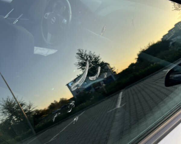 Серый Опель Астра ГТЦ, объемом двигателя 1.6 л и пробегом 203 тыс. км за 3600 $, фото 20 на Automoto.ua