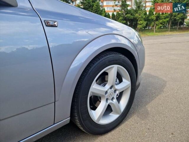 Сірий Опель Астра ГТЦ, об'ємом двигуна 1.8 л та пробігом 119 тис. км за 5999 $, фото 24 на Automoto.ua