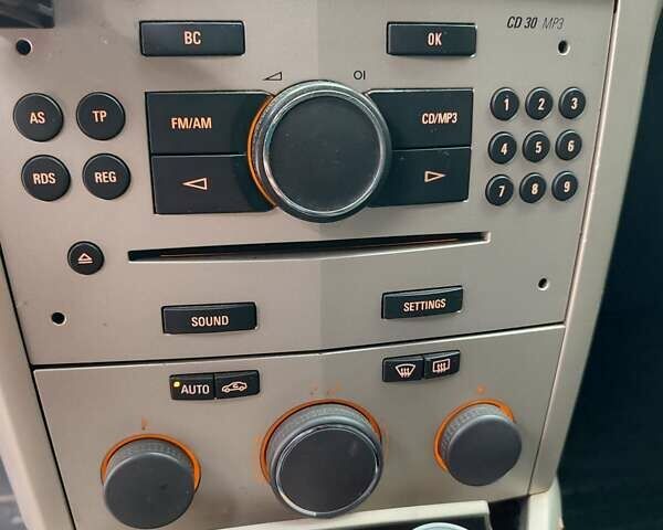 Синий Опель Астра ГТЦ, объемом двигателя 1.6 л и пробегом 233 тыс. км за 6000 $, фото 2 на Automoto.ua