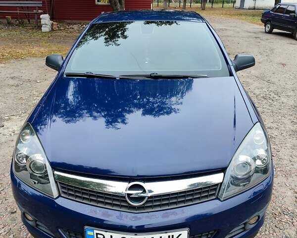 Синий Опель Астра ГТЦ, объемом двигателя 1.6 л и пробегом 233 тыс. км за 6000 $, фото 28 на Automoto.ua