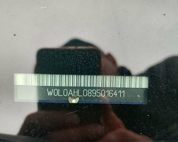 Синий Опель Астра ГТЦ, объемом двигателя 1.6 л и пробегом 233 тыс. км за 6000 $, фото 7 на Automoto.ua