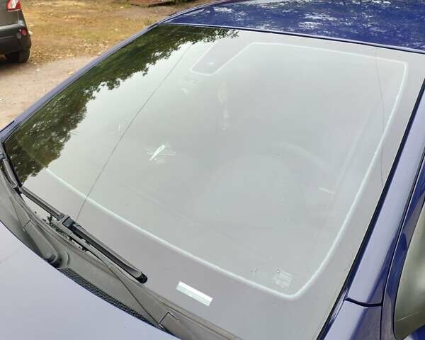 Синий Опель Астра ГТЦ, объемом двигателя 1.6 л и пробегом 233 тыс. км за 6000 $, фото 1 на Automoto.ua