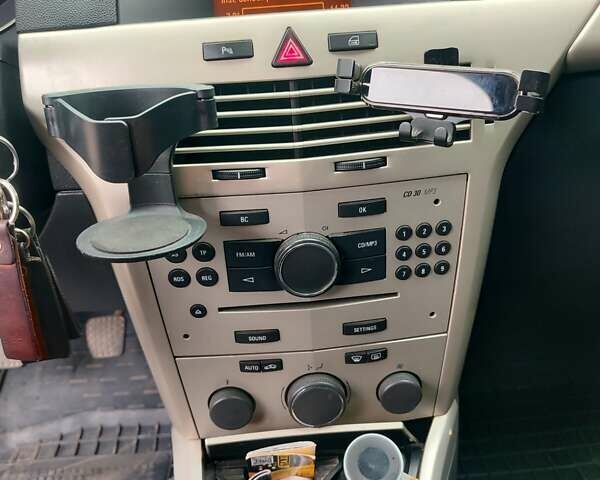 Синий Опель Астра ГТЦ, объемом двигателя 1.6 л и пробегом 233 тыс. км за 6000 $, фото 12 на Automoto.ua