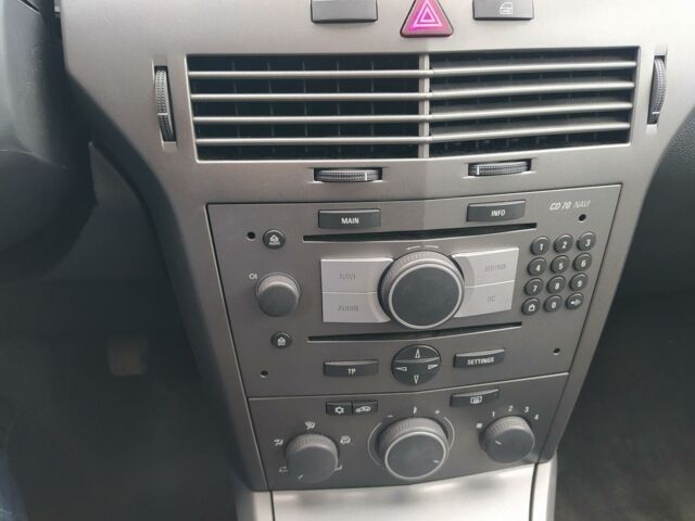 Серый Опель Астра Н, объемом двигателя 1.6 л и пробегом 198 тыс. км за 5499 $, фото 7 на Automoto.ua