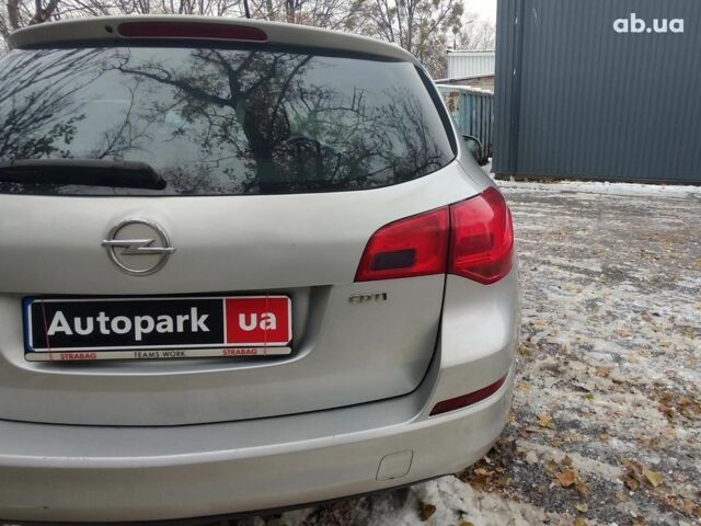 Серый Опель Астра Джей, объемом двигателя 17 л и пробегом 329 тыс. км за 8690 $, фото 8 на Automoto.ua