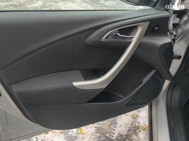 Серый Опель Астра Джей, объемом двигателя 17 л и пробегом 329 тыс. км за 8690 $, фото 10 на Automoto.ua