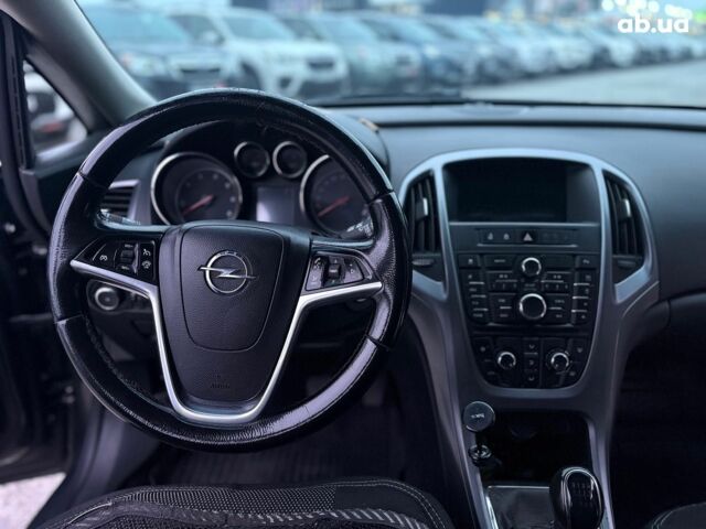Серый Опель Астра Джей, объемом двигателя 1.7 л и пробегом 210 тыс. км за 7990 $, фото 10 на Automoto.ua