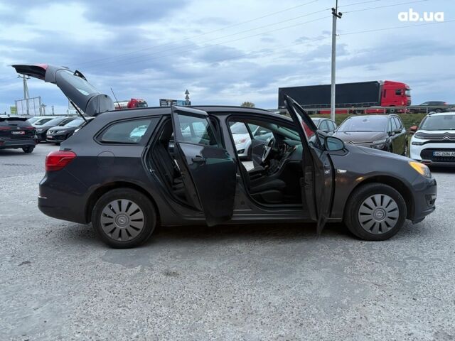 Серый Опель Астра Джей, объемом двигателя 1.7 л и пробегом 210 тыс. км за 7990 $, фото 6 на Automoto.ua