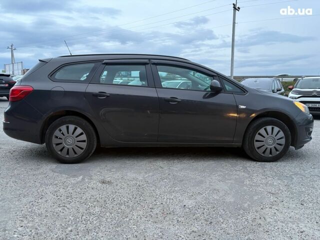 Серый Опель Астра Джей, объемом двигателя 1.7 л и пробегом 210 тыс. км за 7990 $, фото 3 на Automoto.ua