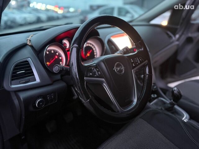 Серый Опель Астра Джей, объемом двигателя 1.7 л и пробегом 210 тыс. км за 7990 $, фото 13 на Automoto.ua