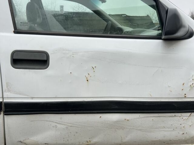 Белый Опель Астра, объемом двигателя 1.6 л и пробегом 300 тыс. км за 950 $, фото 5 на Automoto.ua