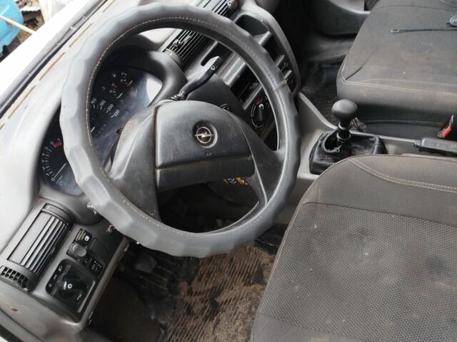 Белый Опель Астра, объемом двигателя 1.4 л и пробегом 123 тыс. км за 650 $, фото 2 на Automoto.ua