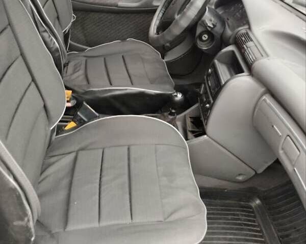 Белый Опель Астра, объемом двигателя 1.4 л и пробегом 501 тыс. км за 2000 $, фото 1 на Automoto.ua