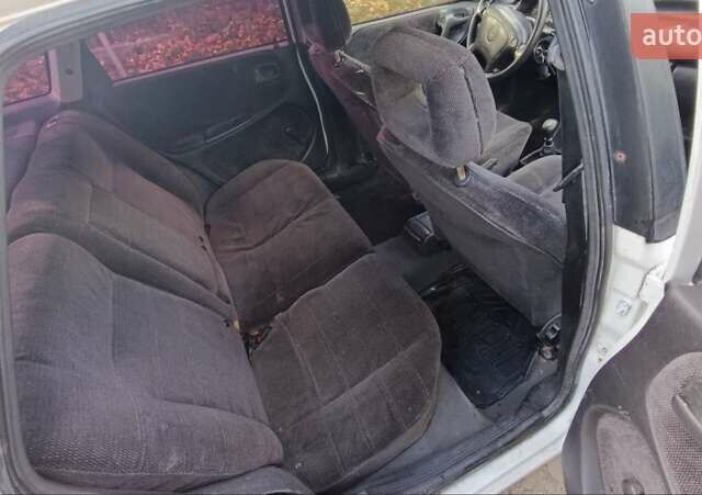 Білий Опель Астра, об'ємом двигуна 1.6 л та пробігом 296 тис. км за 1300 $, фото 10 на Automoto.ua